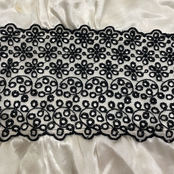 Beautiful silk blouse with black lace trim along the waist area. - Picture 6 of 10